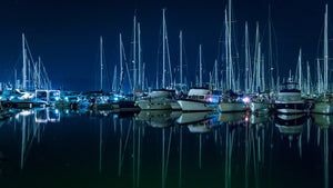 Sailboats Moored at Night - Protect Your Hull from Barnacles with Ultra-SoniTec's Ultrasonic Antifouling System